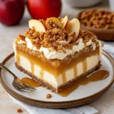 A slice of pie with a fork on a plate.